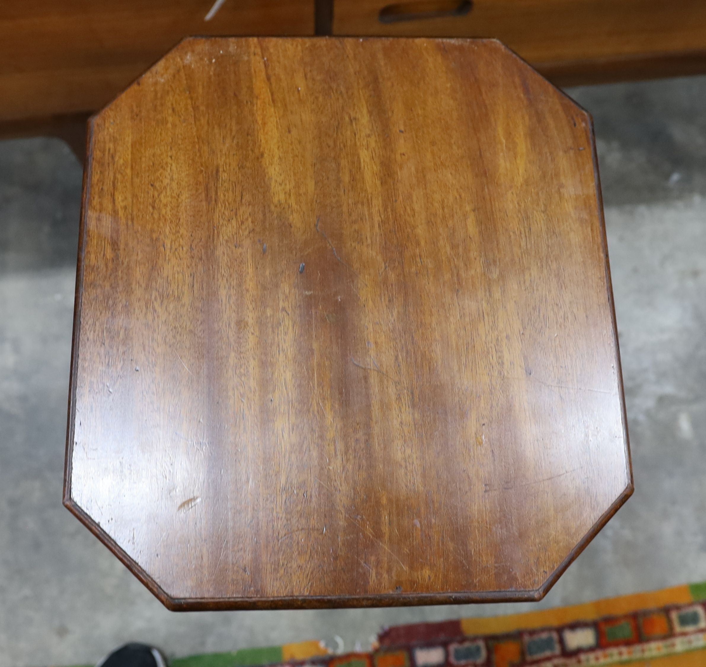 A pair of Regency style octagonal mahogany reeded column tripod wine tables, width 40cm, depth 36cm, height 75cm